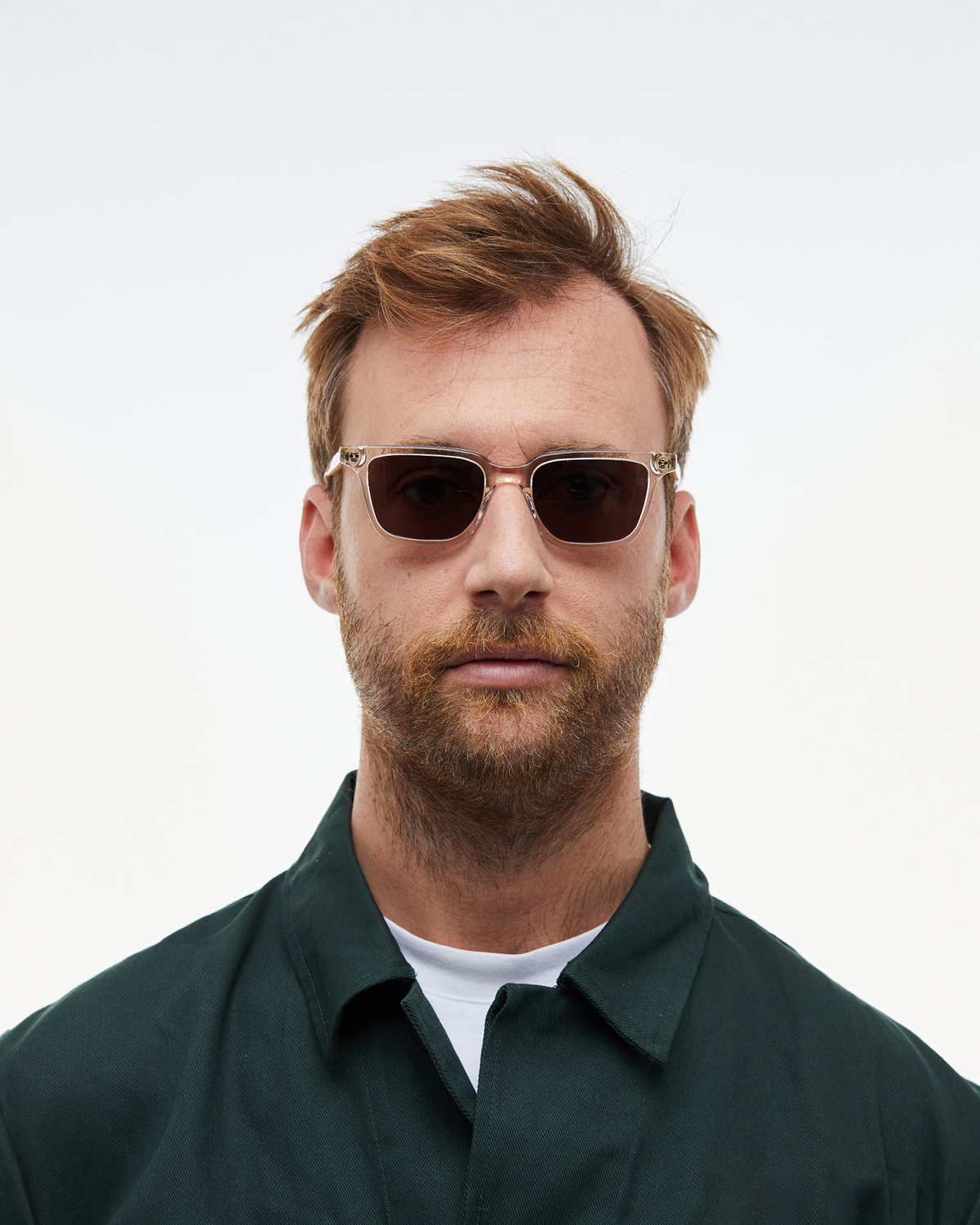 Man wearing Pepino clear rectangle sunglasses with brown lenses, look 3