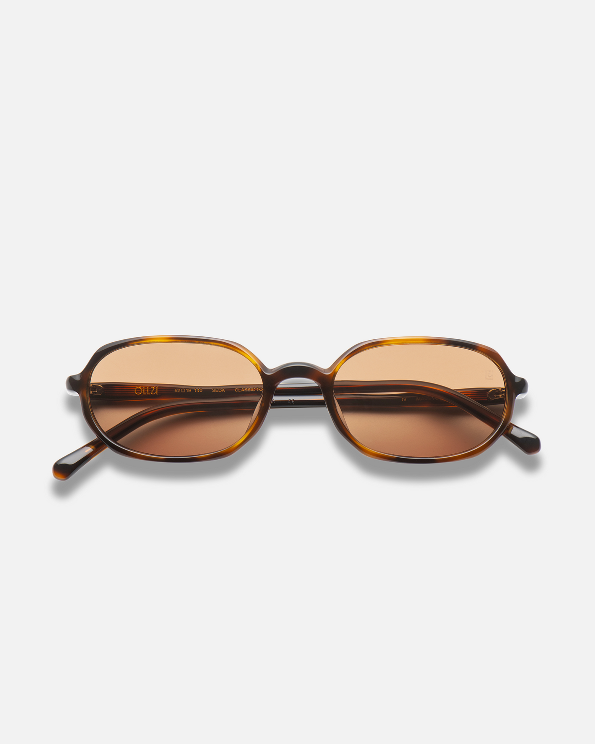 Seda brown 90s oval sunglasses with brown lenses, front view
