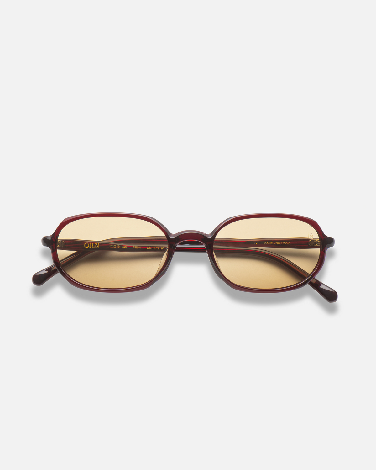 Seda burgundy 90s oval sunglasses with yellow lenses, front view