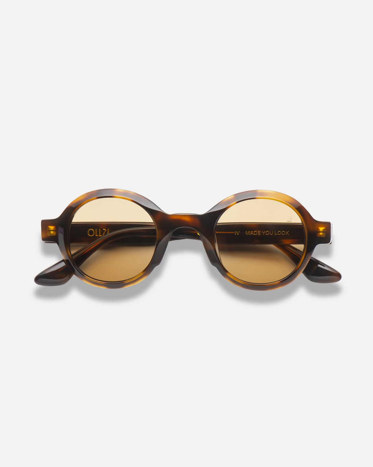 Umi tortoise narrow round sunglasses with yellow lenses, front view