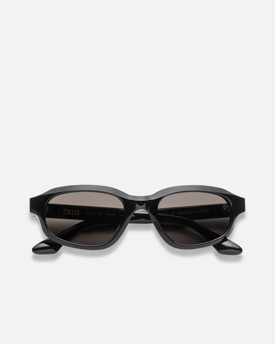 Agaté black oval cat-eye sunglasses with black lenses, front view