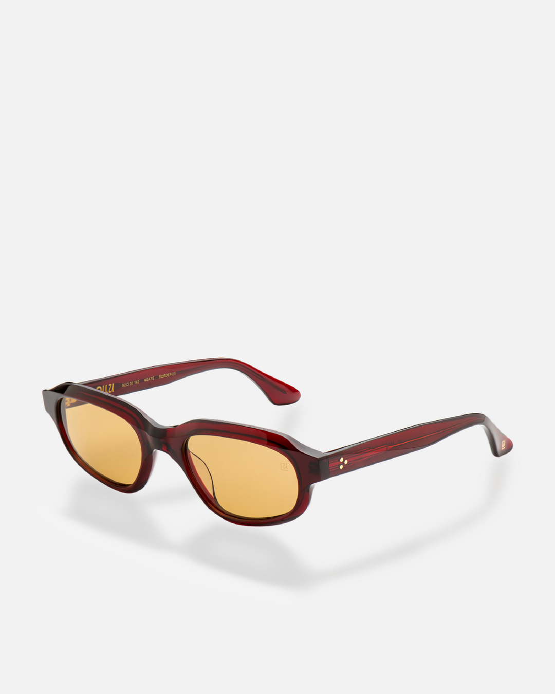Agaté burgundy oval cat-eye sunglasses with yellow lenses, side view