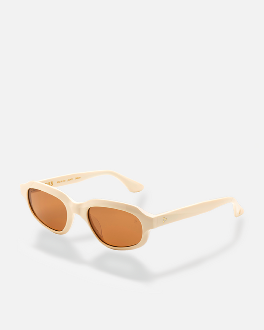 Agaté white oval cat-eye sunglasses with brown lenses, side view