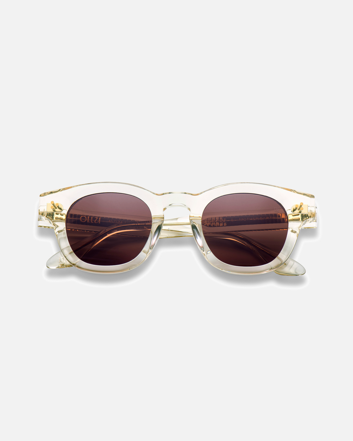 Coco clear round sunglasses with brown lenses, front view
