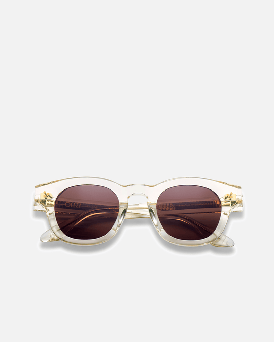 Coco clear round sunglasses with brown lenses, front view