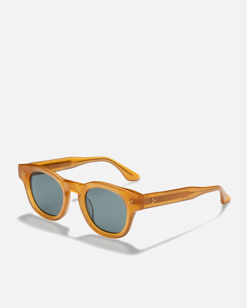 Coco honey yellow round sunglasses with green lenses, side view
