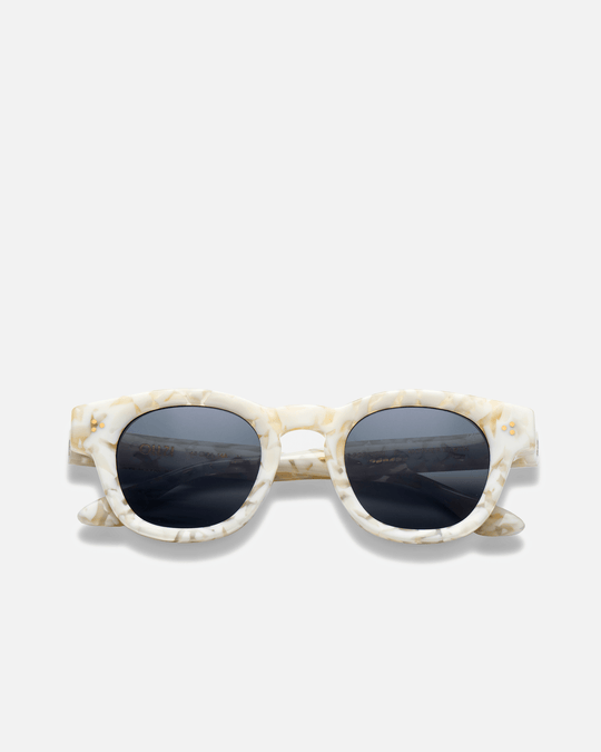 Coco white tortoise round sunglasses with green lenses, front view