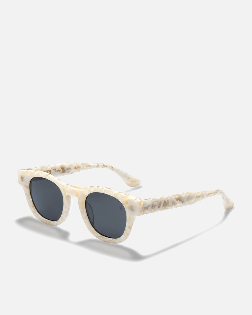 Coco white tortoise round sunglasses with green lenses, side view