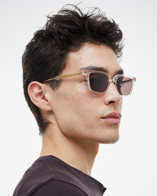 Man wearing Pepino clear rectangle sunglasses with brown lenses, look 2