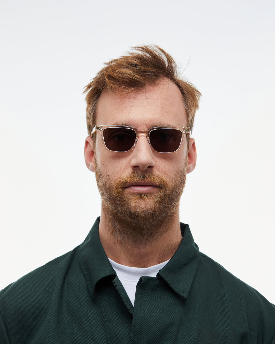 Man wearing Pepino clear rectangle sunglasses with brown lenses, look 3