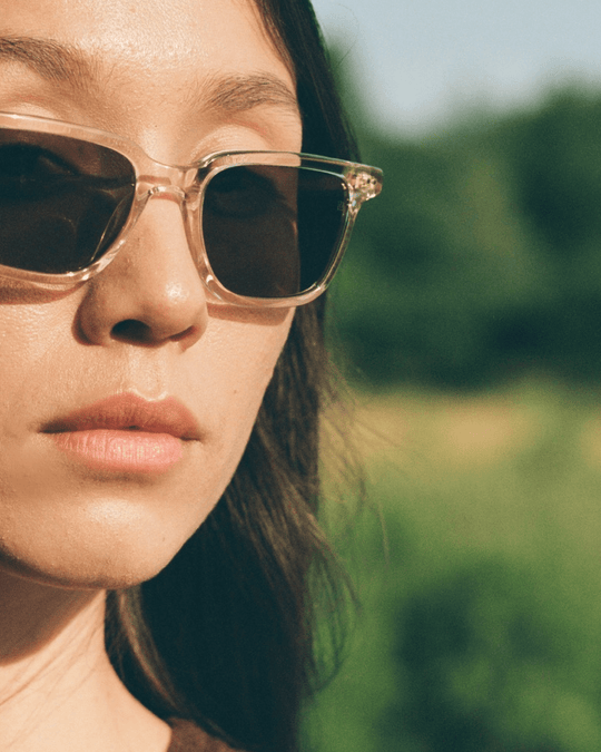 Woman wearing Pepino clear rectangle sunglasses with brown lenses, look 5