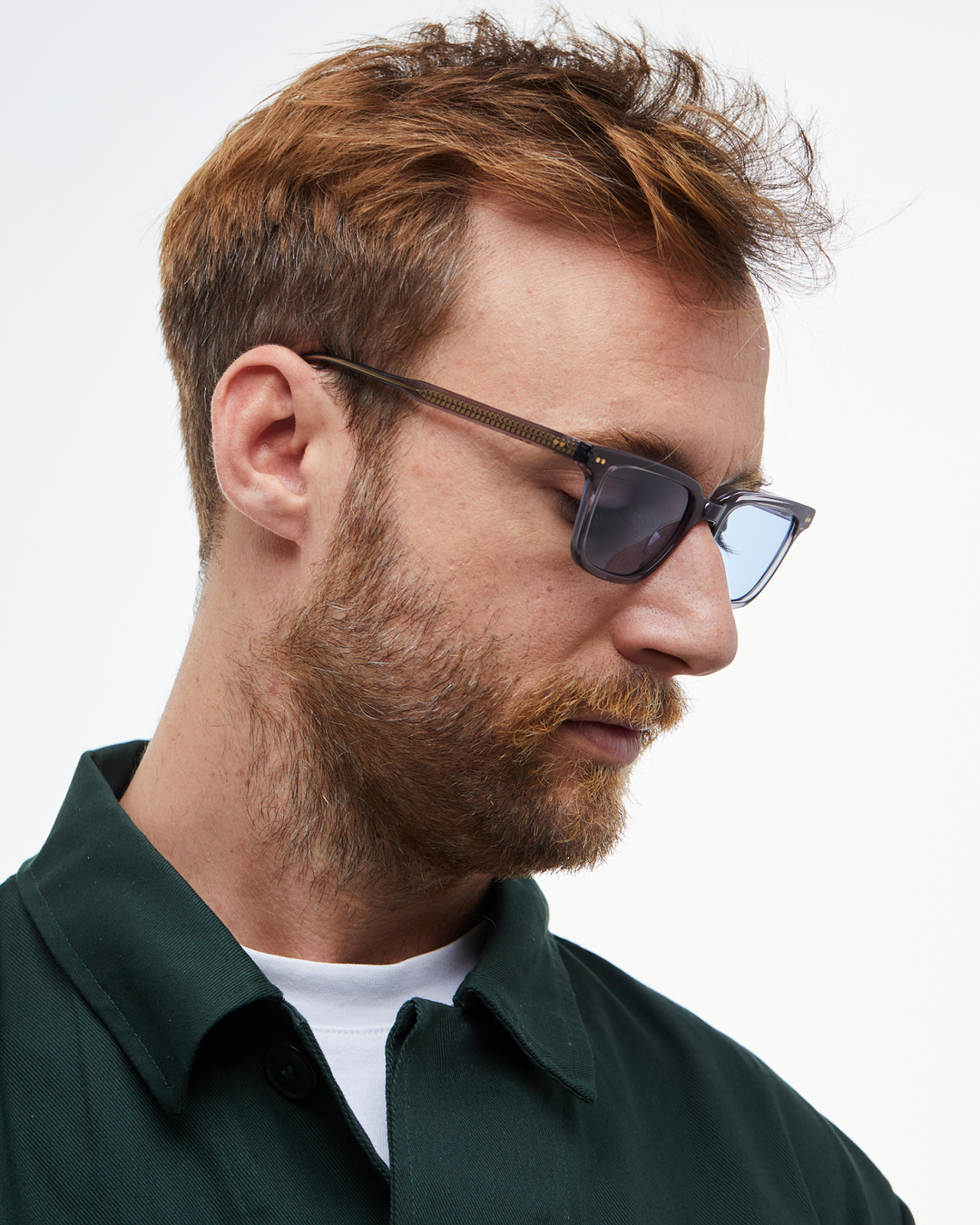 Man wearing Pepino gray rectangle sunglasses with light blue lenses, look 3