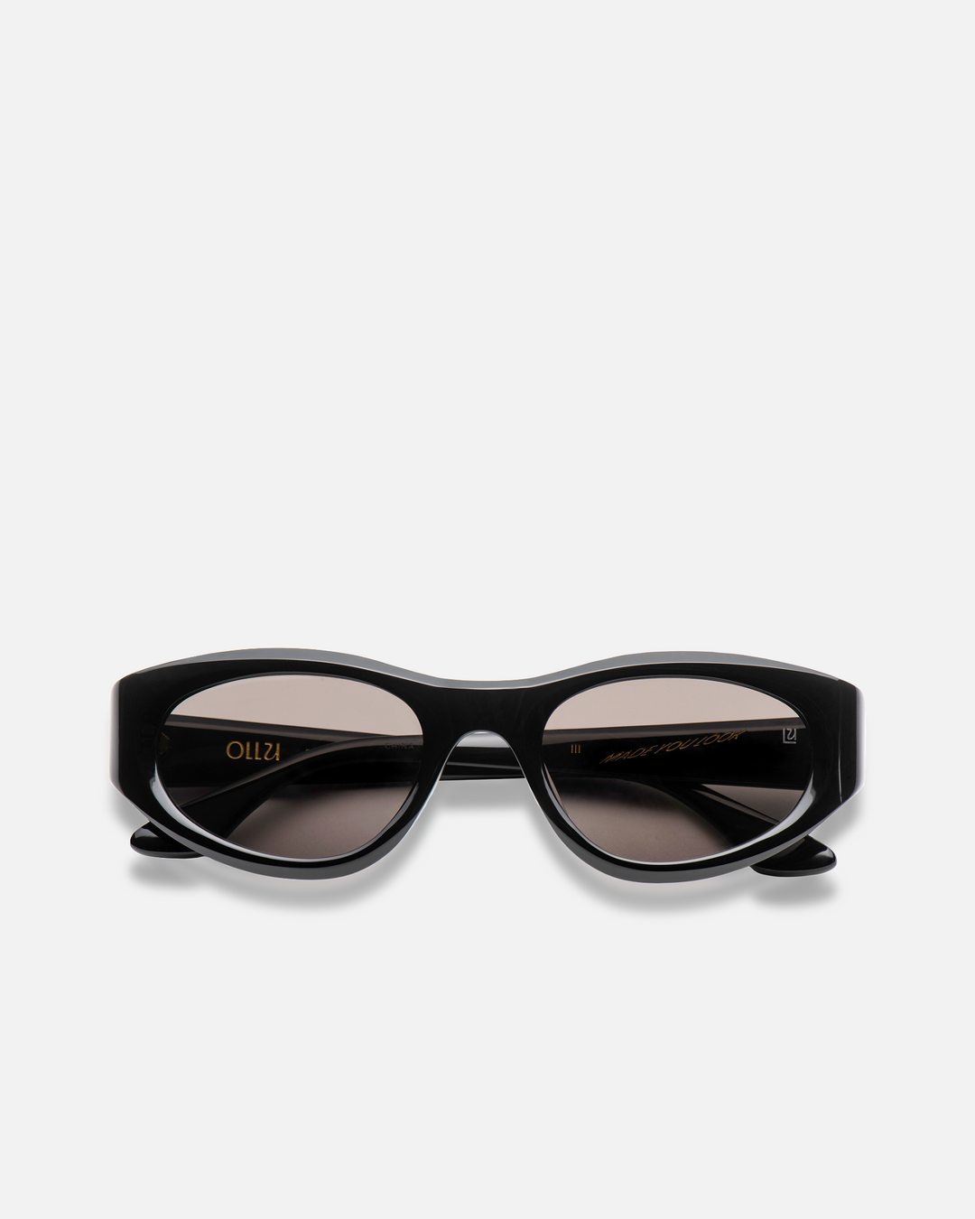 Pomé black oval wrap sunglasses with black lenses, front view