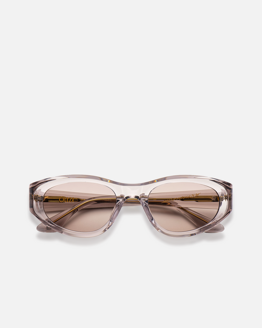 Pomé gray oval wrap sunglasses with light gray lenses, front view