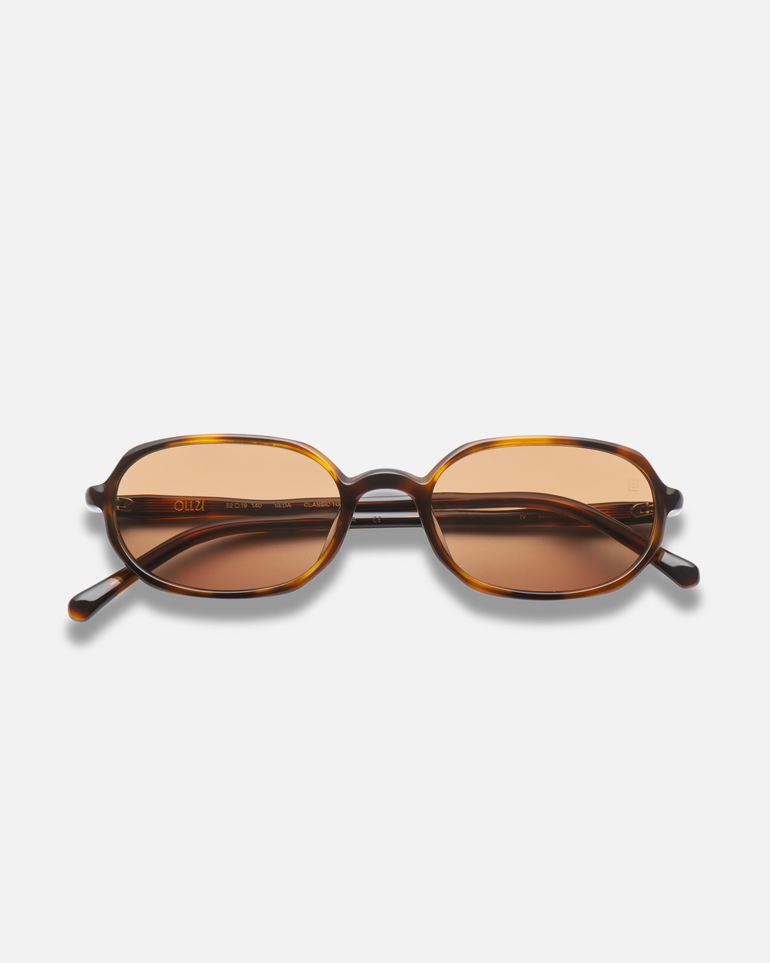 Seda brown 90s oval sunglasses with brown lenses, front view