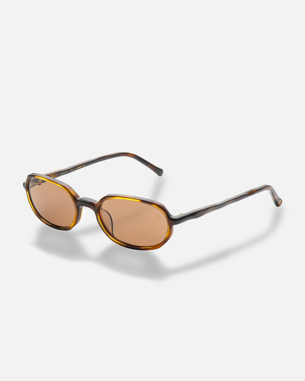 Seda brown 90s oval sunglasses with brown lenses, side view