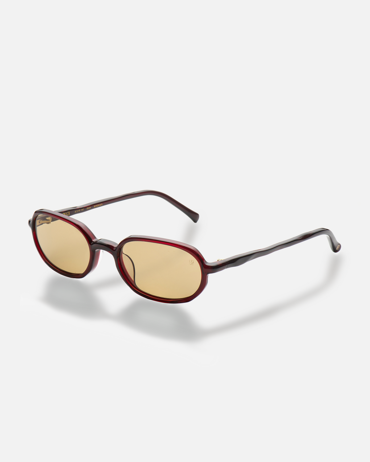 Seda burgundy 90s oval sunglasses with yellow lenses, side view