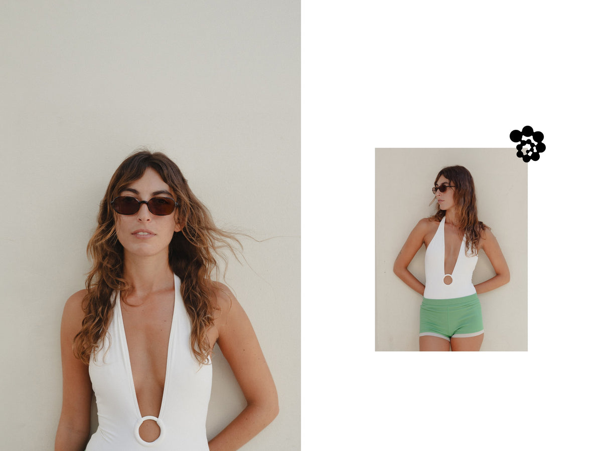 Woman wearing Ollu Seda 90s oval sunglasses in classic tortoise Italian bio-acetate