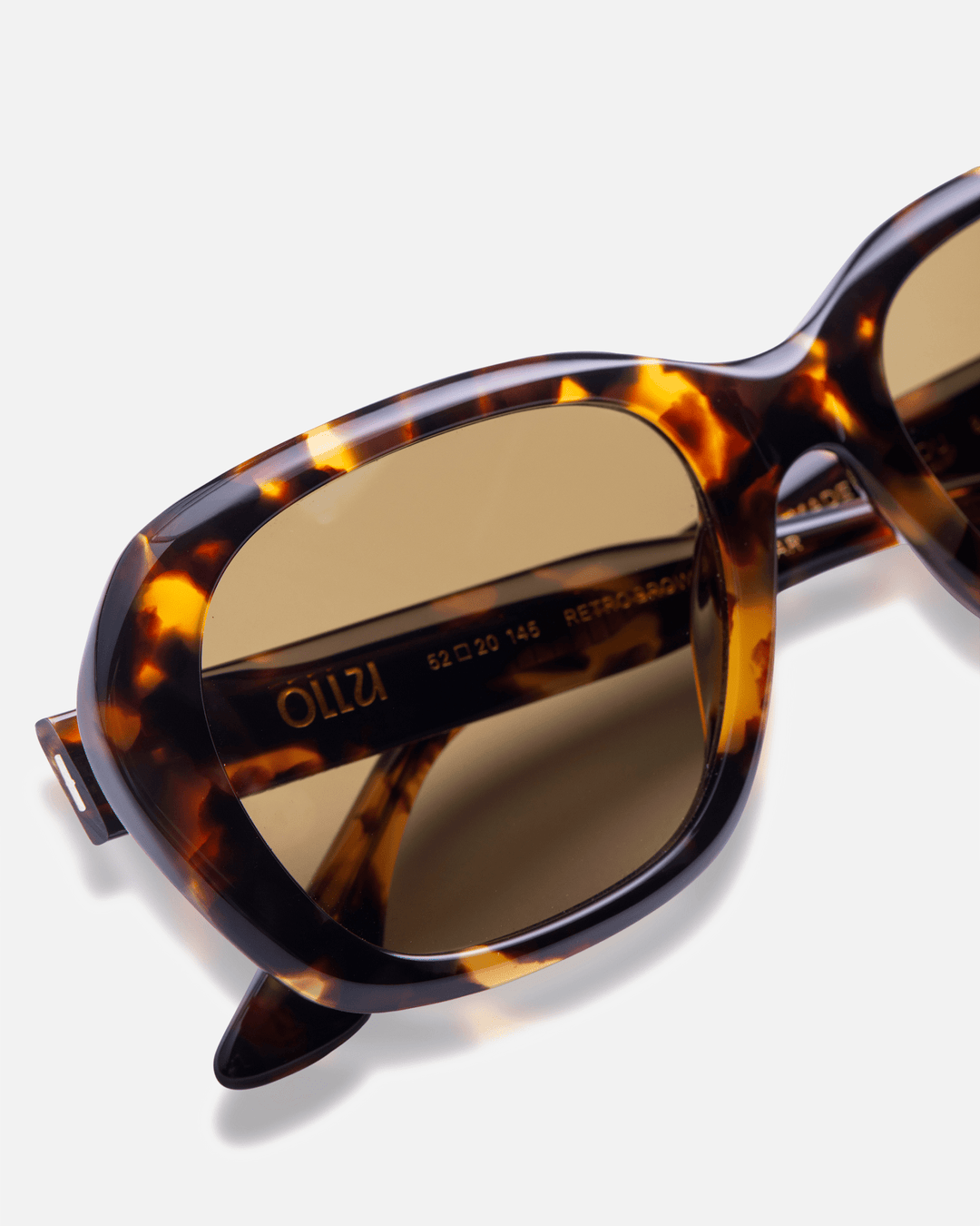 Tamar dark tortoise round sunglasses with brown lenses, angled view