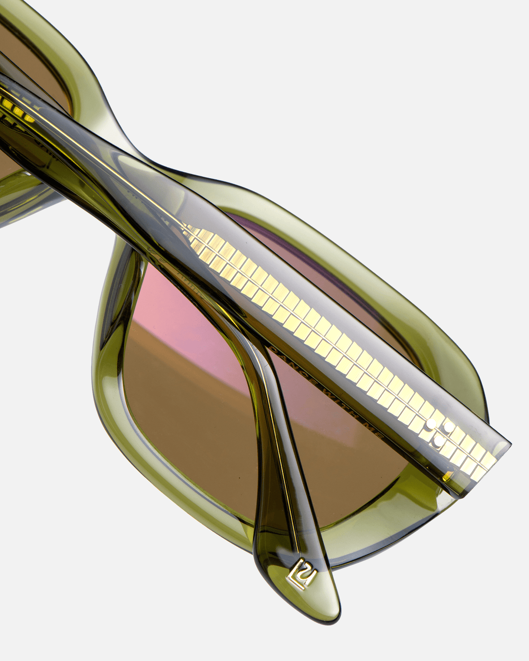 Tamar green round sunglasses with brown lenses, angled view