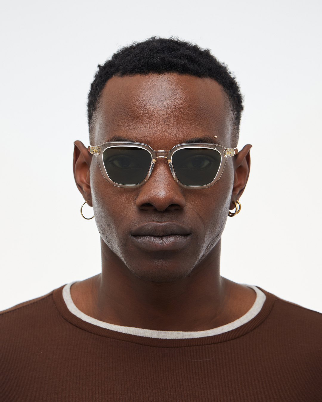 Man wearing Yuzu clear rounded square sunglasses with green lenses, look 3