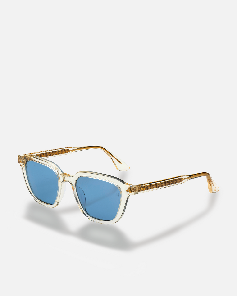 Yuzu clear rounded square sunglasses with light blue lenses, side view