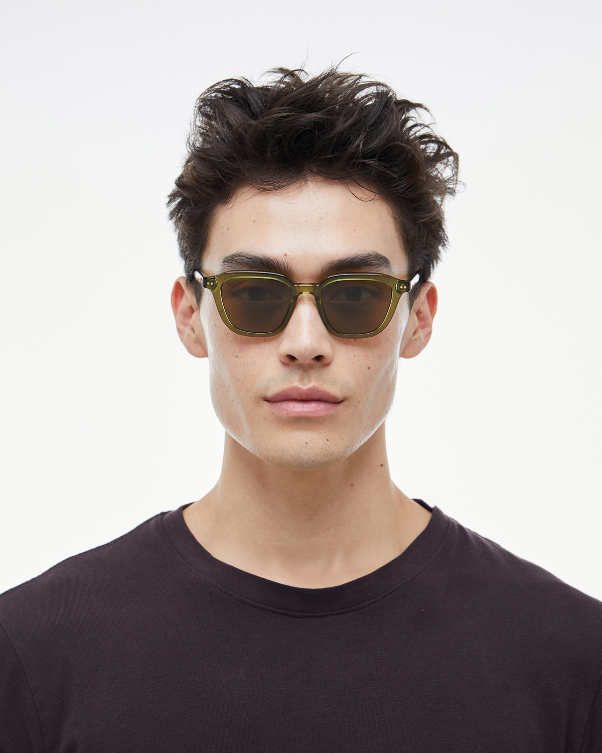 Man wearing Yuzu green rounded square sunglasses with brown lenses, look 2