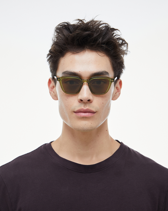 Man wearing Yuzu green rounded square sunglasses with brown lenses, look 2